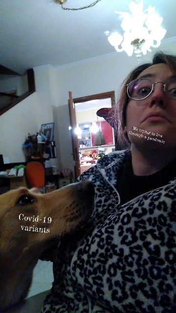 A selfie picture of the author with her dog